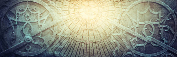 istock Ancient astronomical instruments on vintage paper background. 1295787702