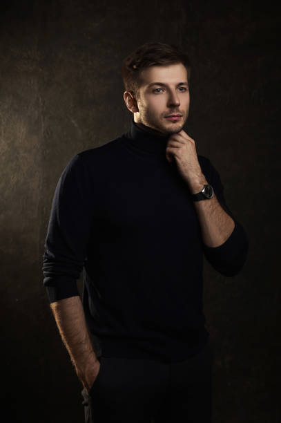 istock Young handsome man wearing a polo neck 1295787716