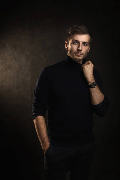 istock Young handsome man wearing a polo neck 1295787754