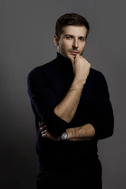 istock Young handsome man wearing a polo neck 1295787889