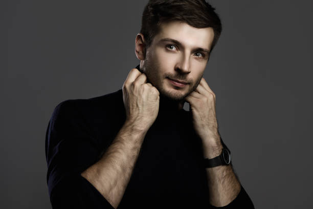 istock Young handsome man wearing a polo neck 1295788547