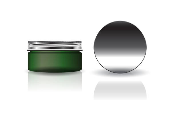 istock Blank green round cosmetic jar with silver lid for beauty or healthy product. 1295788807