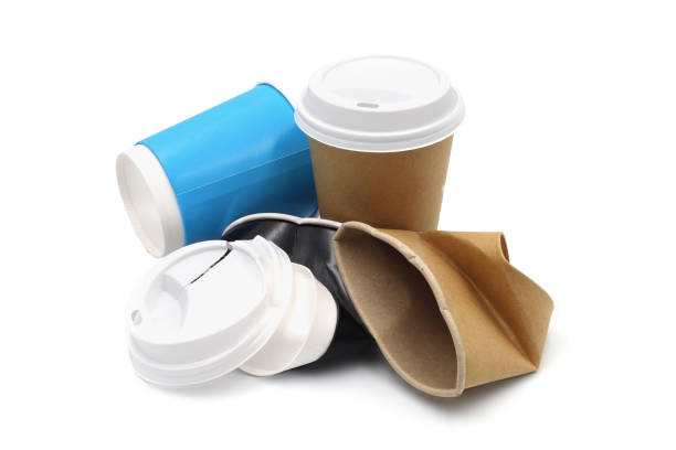 trashed coffee to go cups. waste on white isolated background. - paper white garbage nobody imagens e fotografias de stock