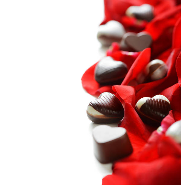 chocolate candies and rose petals