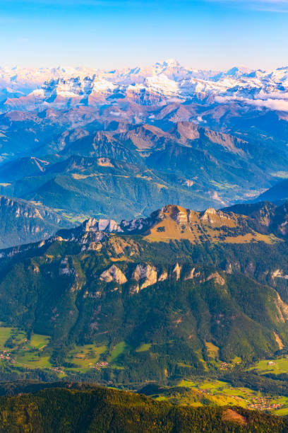 Aerial view on the Swiss Alps with snow peaks Aerial view on the Swiss Alps with green valley and snow peaks, Switzerland swiss alps photos stock pictures, royalty-free photos & images
