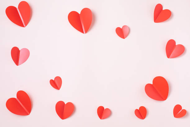 istock Valentine day composition with red hearts on pink background. 1295790394