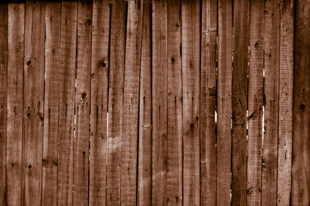 wood old weathered textured rustic fence vertical plank wall with knots