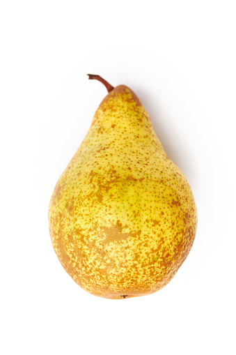 A pear photographed from above on a white background as a cut-out in the studio, high-resolution and full-format