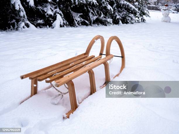 Wooden Sledge In A Wintry Landscape On The Mountainn Stock Photo - Download Image Now