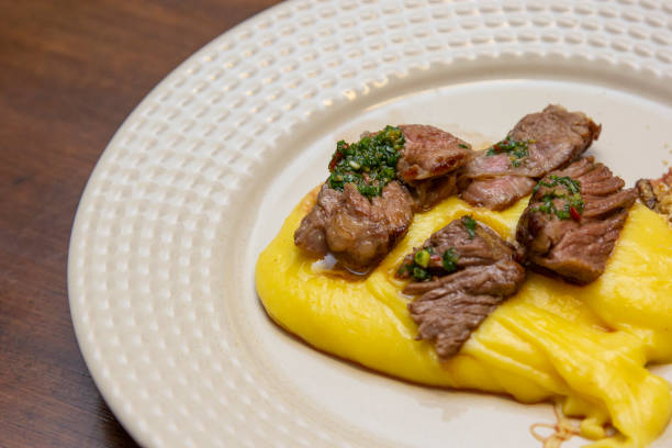 istock Ancho steak with mashed and crispy manioc flour. 1295795992