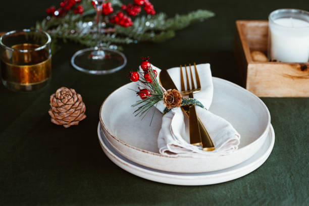 istock Festive table setting with winter decor. The concept of Thanksgiving or Christmas family dinner. 1295798708