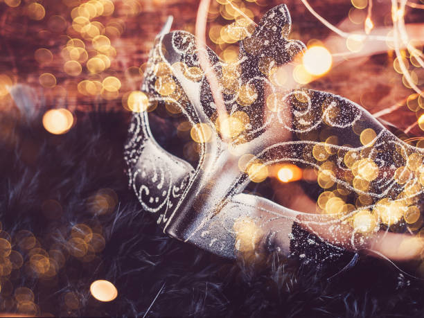 istock Vintage carnival mask. Preparing for the holidays 1295799950