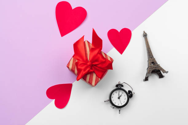 istock Gift box and paper hearts with copy space, St. Valentine's day composition 1295800415