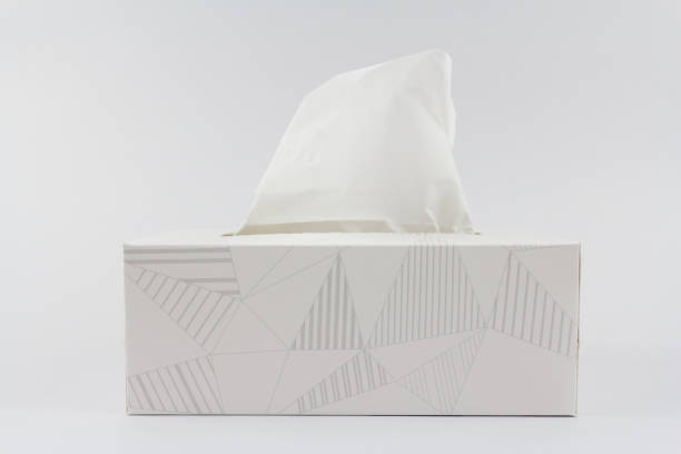White tissue paper box on the white background. White tissue paper box on the white background. facial tissue photos stock pictures, royalty-free photos & images