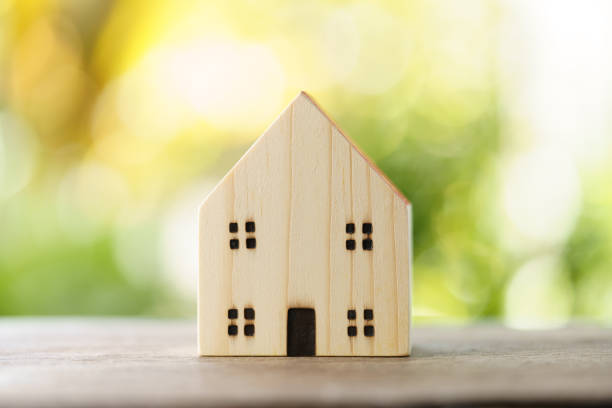 istock model house model .using as background business concept and real estate concept with copy space for your text or design. 1295805435