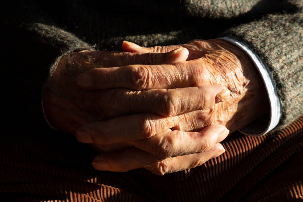 istock Hands of an elderly man Galicia Spain 1295809482