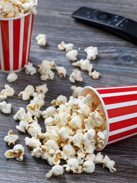 istock A closeup of two paper containers with fresh popcorn 1295811054