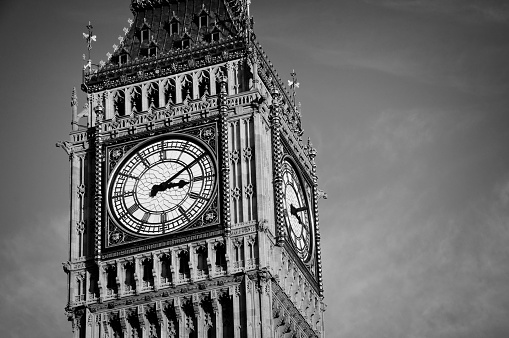 Close up on Big Ben clock in London, UK with copy space. Black and white photography