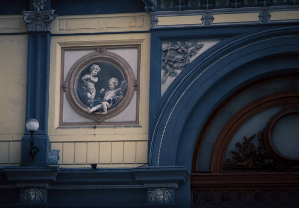 Decorative façade above an archway in Naples