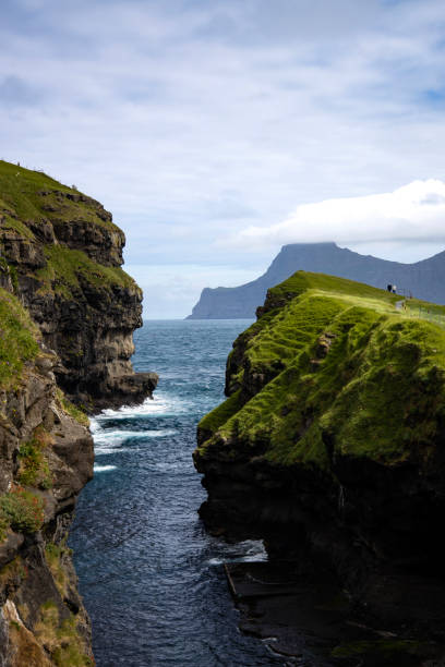istock Dramatic Cliff at gjogv, Faroe Island 1295813356
