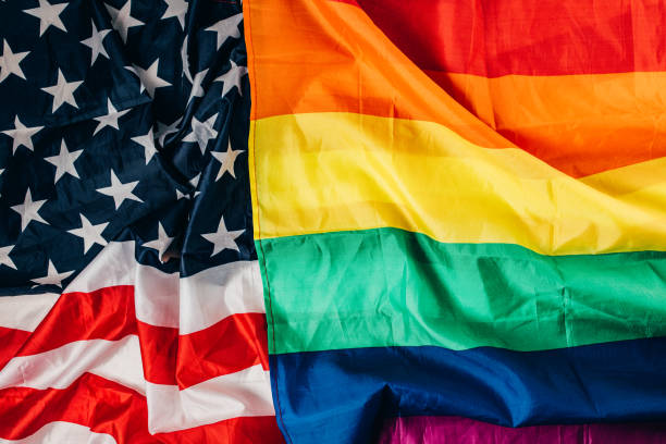 istock US national and LGBTQI flag 1295819422