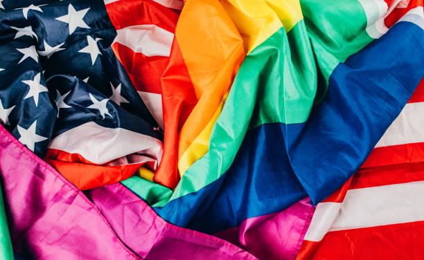 istock US national and LGBTQI flag 1295819451