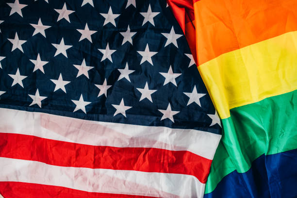 istock US national and LGBTQI flag 1295820176