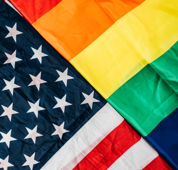 istock US national and LGBTQI flag 1295820216