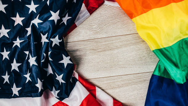 istock US national and LGBTQI flag 1295820233