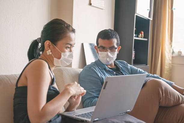 istock Social Distancing at home 1295823955