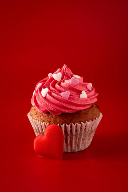 istock Cupcakes decorated with sugar hearts for Valentine's Day 1295827496