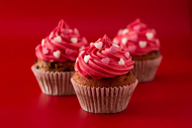 istock Cupcakes decorated with sugar hearts for Valentine's Day 1295827510