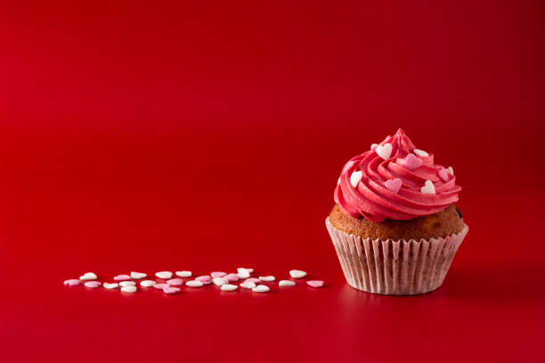 istock Cupcakes decorated with sugar hearts for Valentine's Day 1295827526