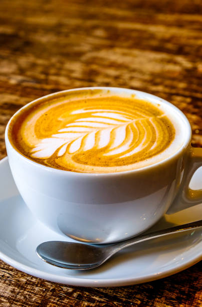 istock Cup of Cappuccino at a cafe 1295827581