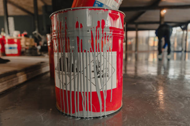 istock Tin bucket with toxic composition and epoxy resin inside 1295831097