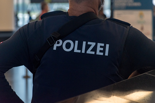 Polizei inscription on Austrian police officer (Polizei means Police in German language).
