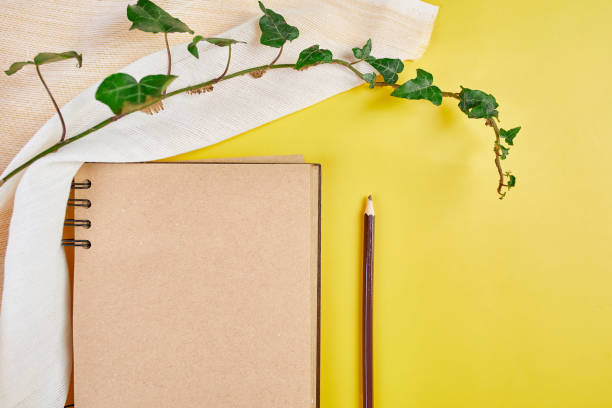 istock Flat lay top view notebook, notes with flowers Future family, house, life goals 1295836291