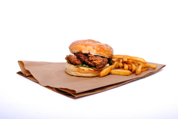 Chicken burger with french fries.