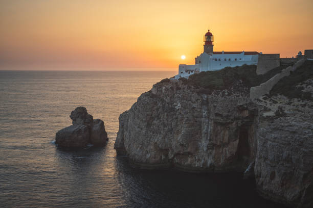 istock Sao Vicente lighthouse at sunset 1295837381