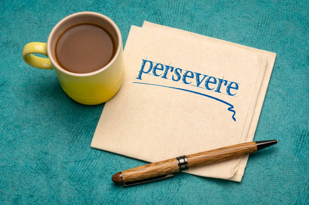 istock persevere motivational note on napkin 1295837619