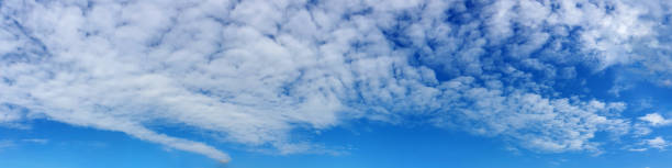 istock Panorama sky with cloud on a sunny day. 1295839436