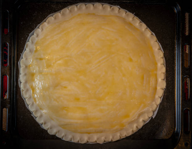 istock Paris, France - 01 11 2021: Preparation of a Kings cake 1295842108
