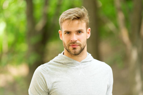 istock Totally ready. Sport challenge. Confident and physically strong. Athlete outdoors. Handsome man park nature background. Sport training and workout. Make yourself proud. Sport goal and achievement 1295844139