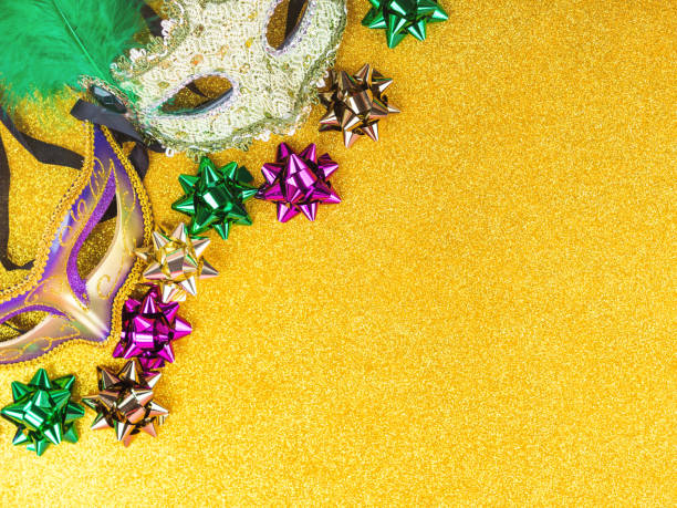 istock Carnival mardi gras party masks on gold background 1295847847