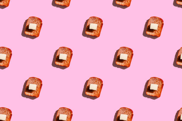 Roasted slice of toast bread with cream cheese and jam isolated on white background. Clipping path included