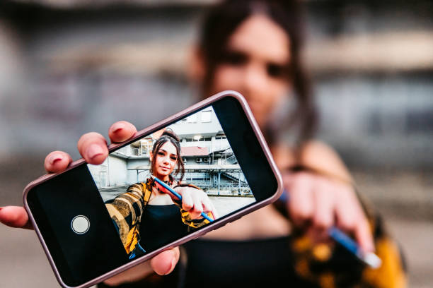 istock Artist woman making selfie with pencil 1295850008