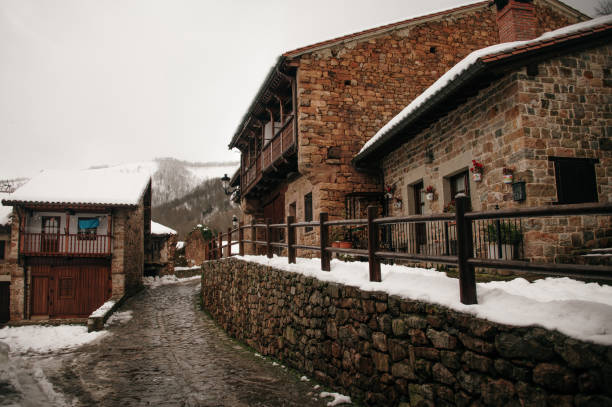 istock Barcena Mayor, Cantabria, Spain, with snow 1295851091