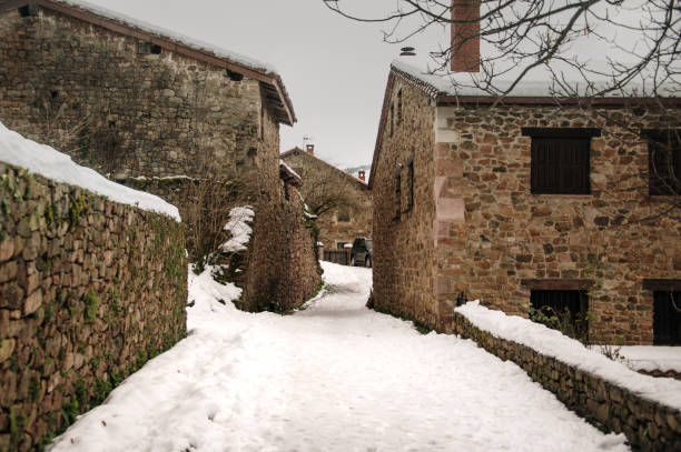 istock Barcena Mayor, Cantabria, Spain, with snow 1295851116