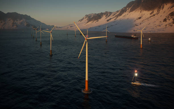 istock Wind turbines farm in sea 1295852568