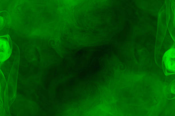 istock Green steam on a black background. 1295853742